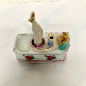 Japanese porcelain "Naughty Nodder" ashtray or figurine, likely from the 194